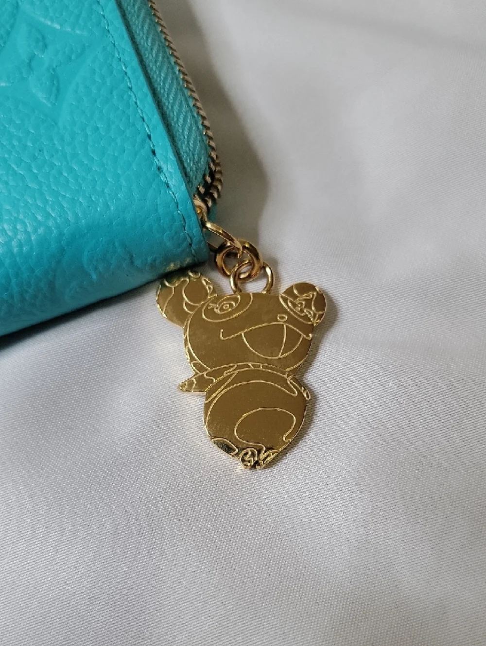 Louis Vuitton X TM Turquoise Embossed Monogram Zip Wallet